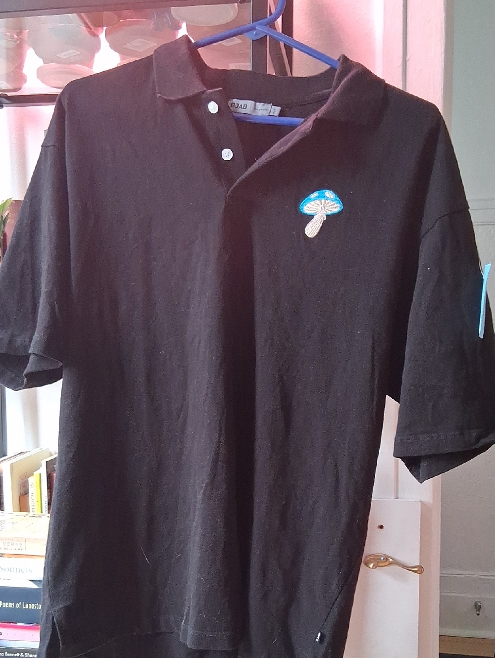 Men's Black Polo Shirt with Blue Mushroom Patch